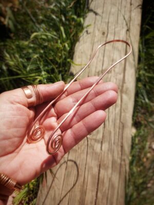 koperen tongschraper met tesla coils