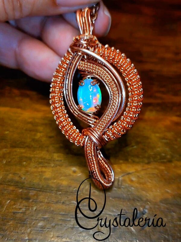 white opal ethiopië 2.1carat copper wire