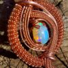 white opal ethiopië 2.1carat copper wire