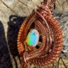 white opal ethiopië 2.1carat copper wire